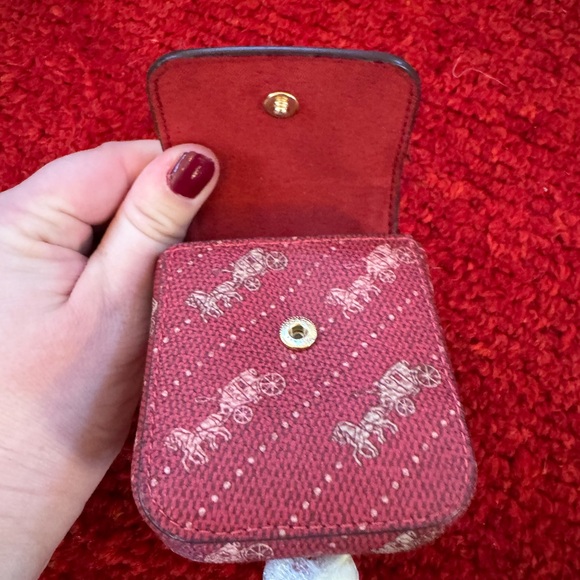 Coach Burgundy AirPods Case with Gold Accents - Picture 3 of 3